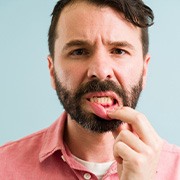 A man with red gums