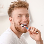 A man brushing his teeth