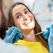 Woman visiting an implant dentist in Fairfax