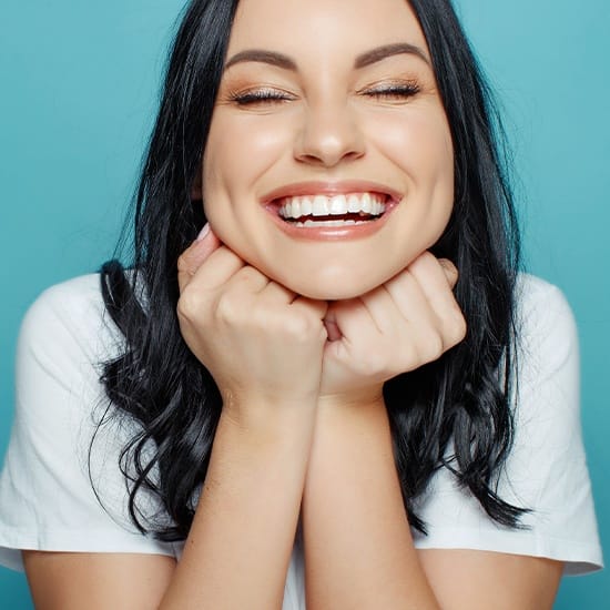 Woman sharing smile after gum recontouring