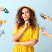 Woman surrounded by credit cards