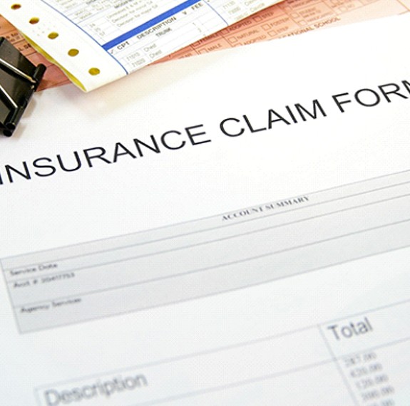 Dental insurance claim form on desk