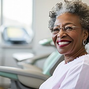 Woman happy about dentures