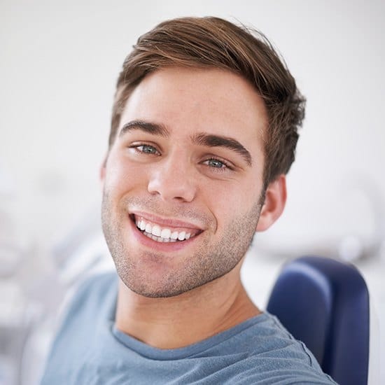 Man sharing smile after fluoride treatment
