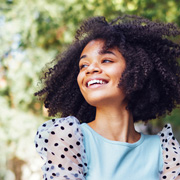 Teen girl smiling on walk outside