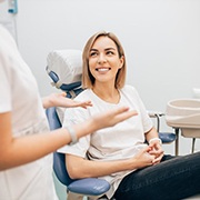 woman talking to her dentist 